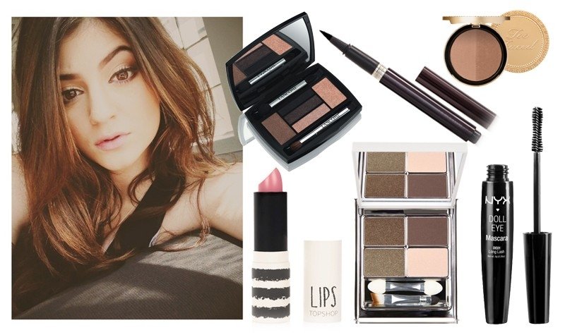 Kylie Jenner. Šešėliai „Hypnôse Star Eyes Palette“ („Lancome“),  blakstienų tušas „Doll Eye Mascara Long Lash“ („NYX“), douglas.lt; Akių kontūras „Laura Mercier“, šešėliai „New CID Cosmetics“, lūpų dažai „Top Shop“, polyvore.com; Bronzatas „Too Faced“, as